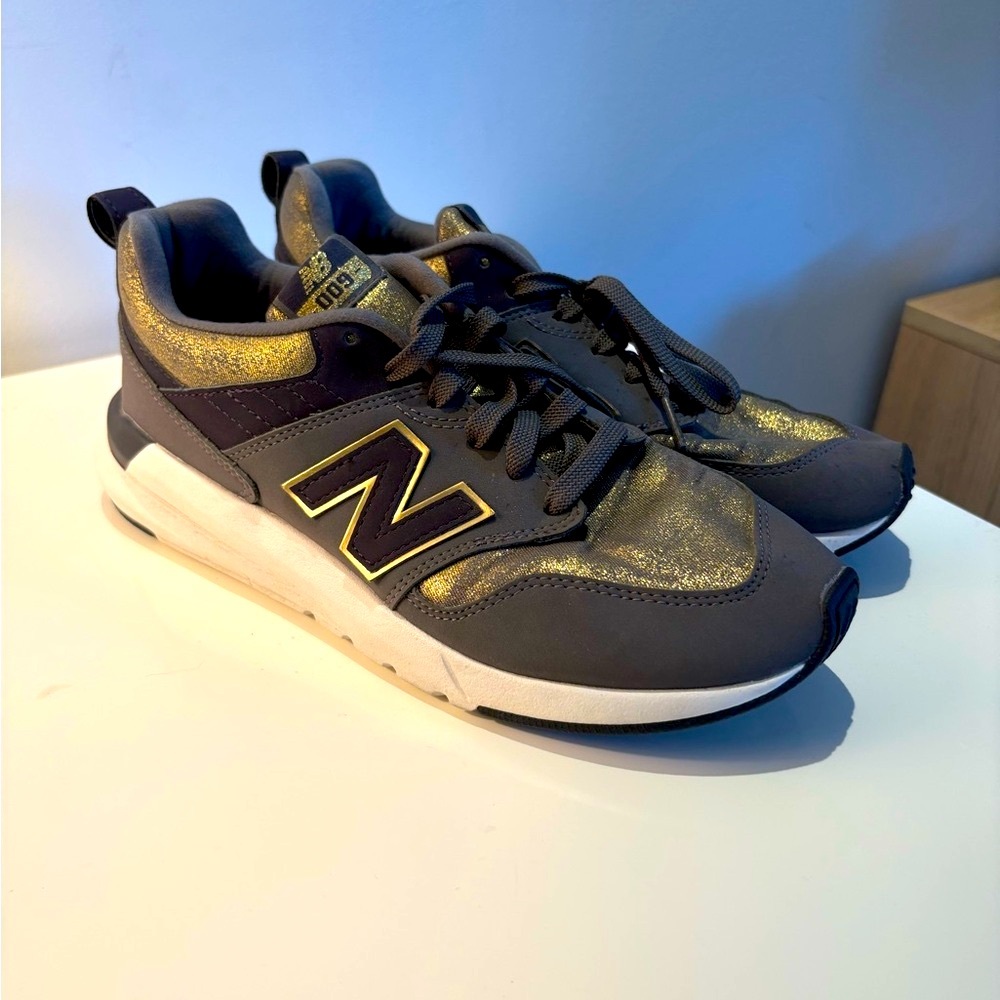 New Balance Gray and Gold Sneakers